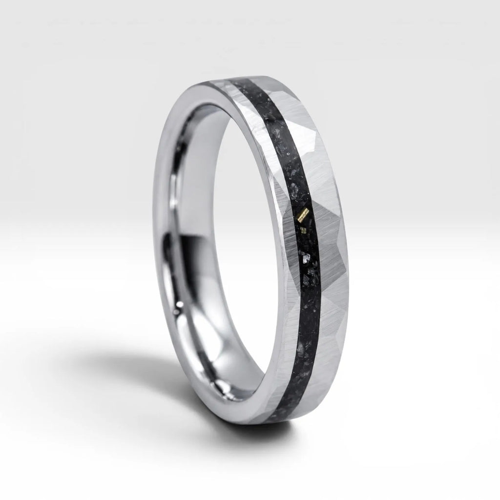 Slim tungsten wedding ring with black tourmaline and gold inlay, faceted finish with refined elegant design