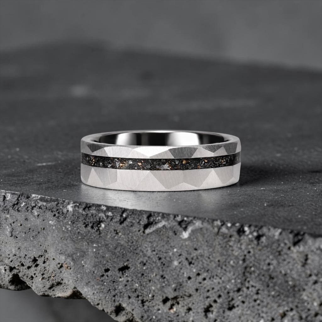Faceted tungsten wedding ring with black tourmaline and 14k gold inlay in a 2mm offset channel