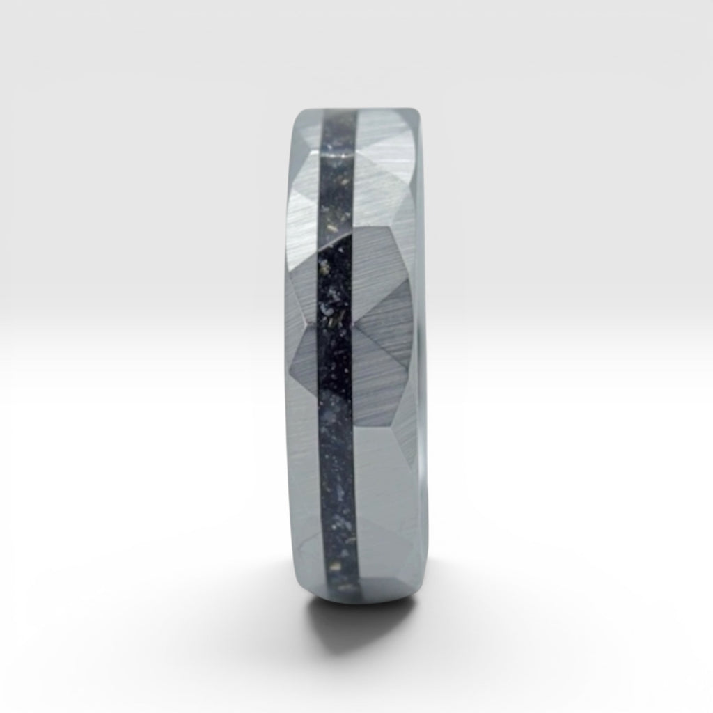 Faceted tungsten wedding ring with black tourmaline and 14k gold inlay in a 2mm offset channel