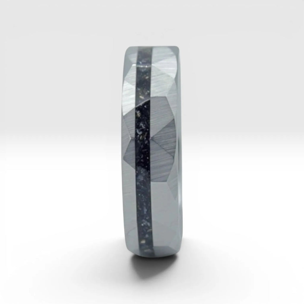 Faceted tungsten wedding ring with black tourmaline and 14k gold shavings inlay in a 2mm offset channel