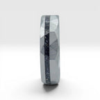 Faceted tungsten wedding ring with black tourmaline and 14k gold shavings inlay in a 2mm offset channel